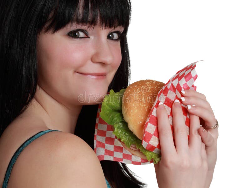 Girl eating a burger stock image. Image of woman, white - 17349189