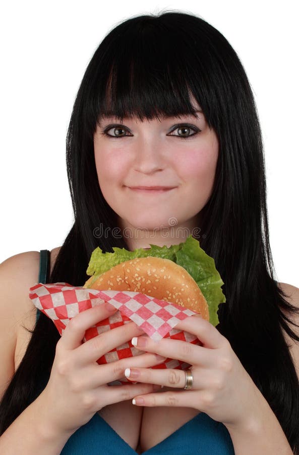 Girl eating a burger stock image. Image of woman, white - 17349189