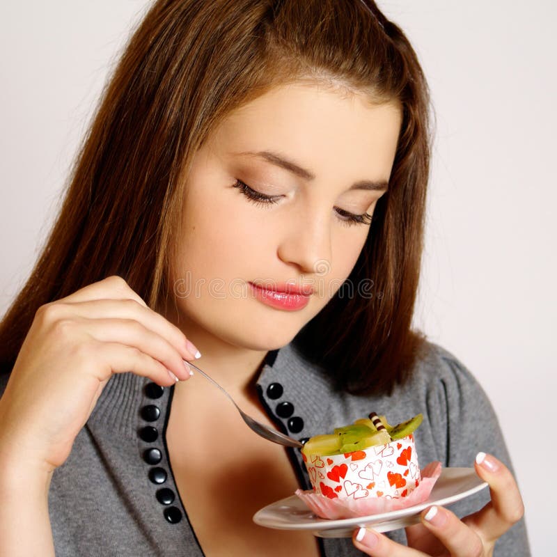 Girl eating cake stock photo. Image of diet, beautiful 12146916