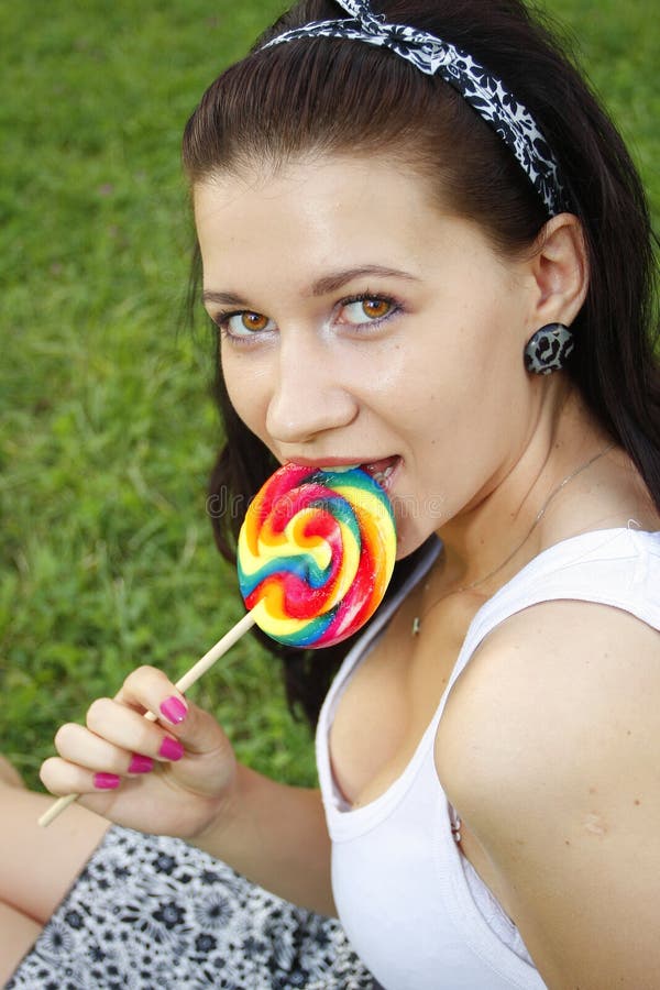 Girl eating candy stock image. Image of model, skin, european 27999349