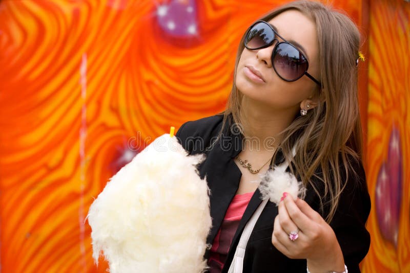 Girl eating candy floss