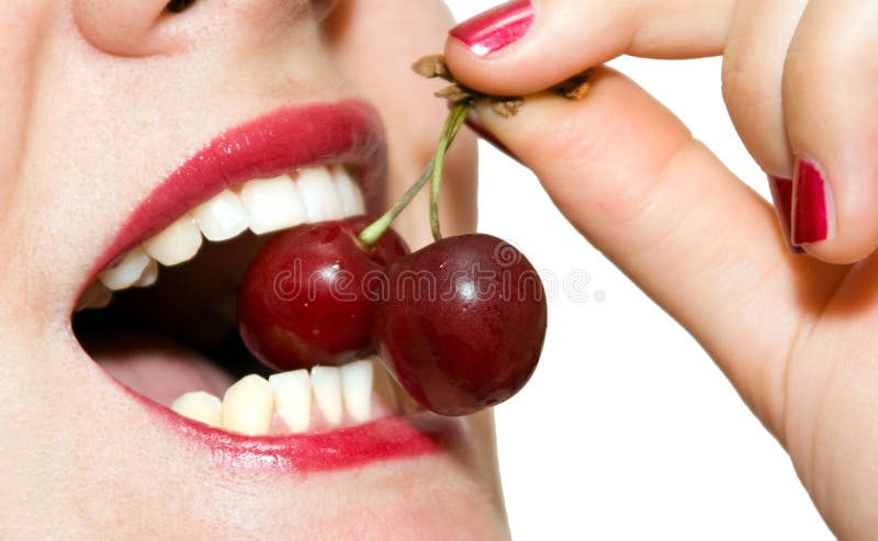 Girl eating cheries