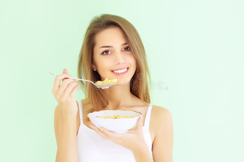 Girl eating cornflakes