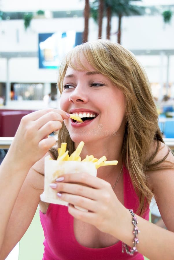 Girl eating french-fries