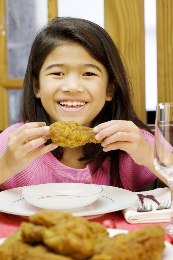 Girl Eating Fried Chicken Drumstick Stock Photo Image of candles