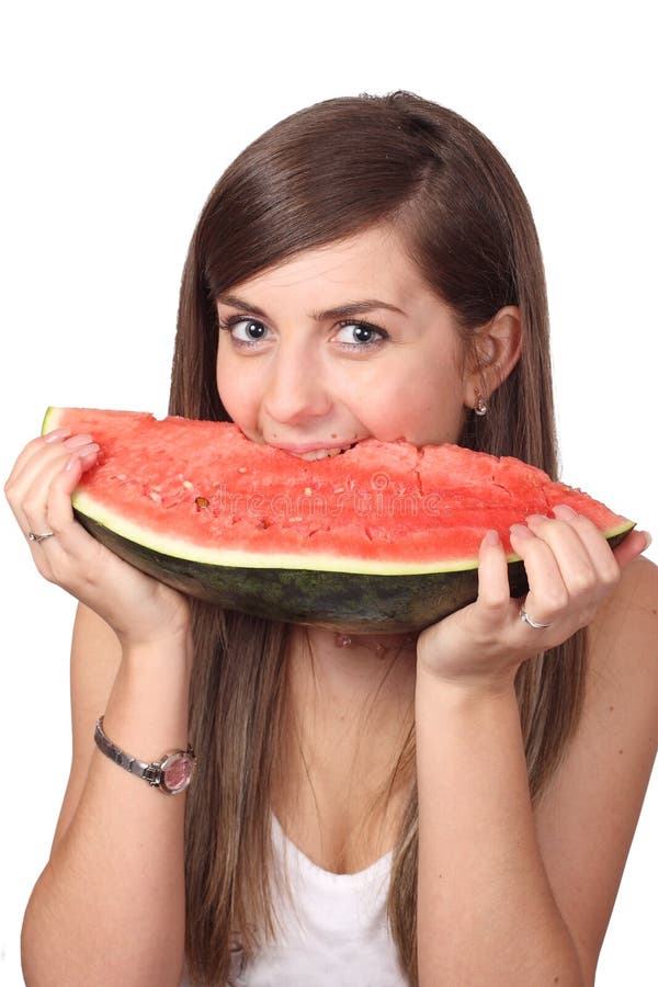 Girl eating slice of water-melon