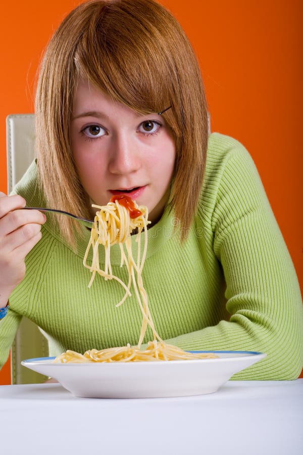 Girl eating spaghetti stock photo. Image of person, eating 7501420