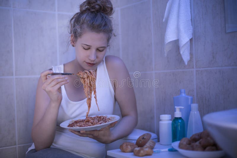 Girl eating spaghetti