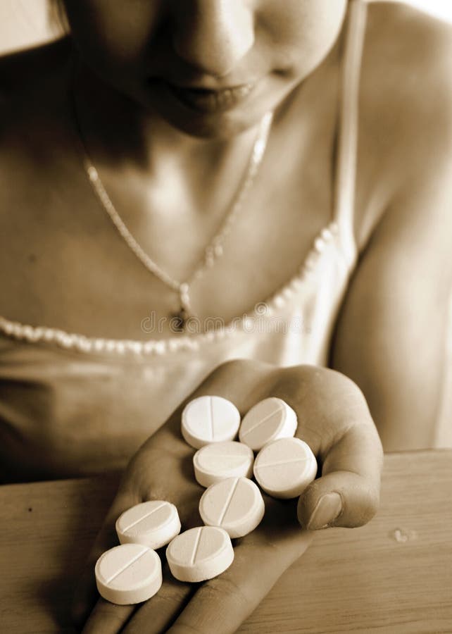 The girl eating tablets