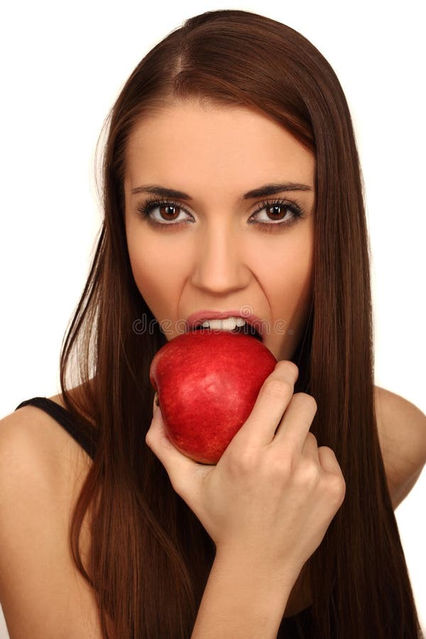 The girl eats a apple royalty free stock image