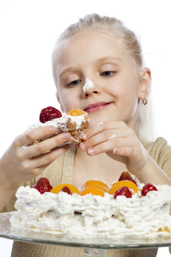 Girl eats a cake stock photo. Image of cute, cake, birthday 98070304