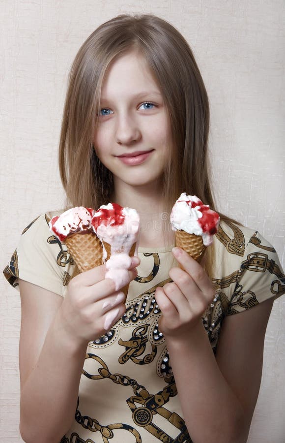 The girl eats ice-cream