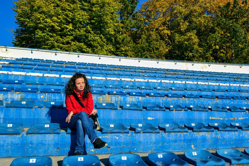 Girl on Empty Stadium royalty free stock photo Girl on Empty Stadium royalty free stock photo