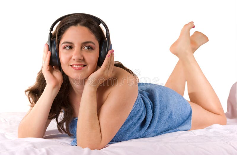 Girl Enjoying in a towel with headphones