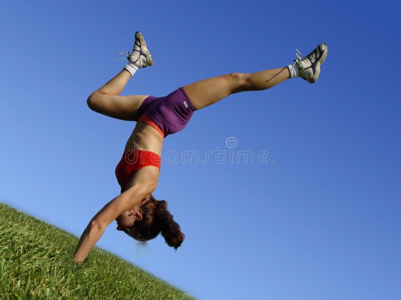 Girl exercising outdoors stock photo Girl exercising outdoors stock photo