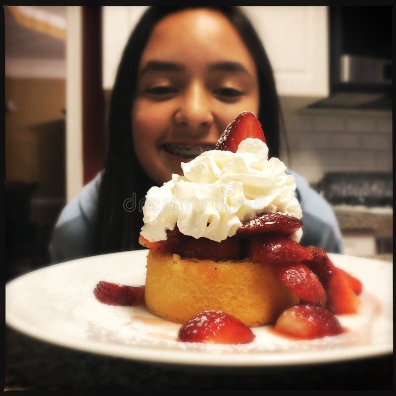 Girl eyeing up strawberry shortcake