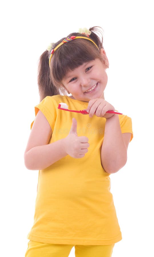 Girl flossing her teeth stock photos