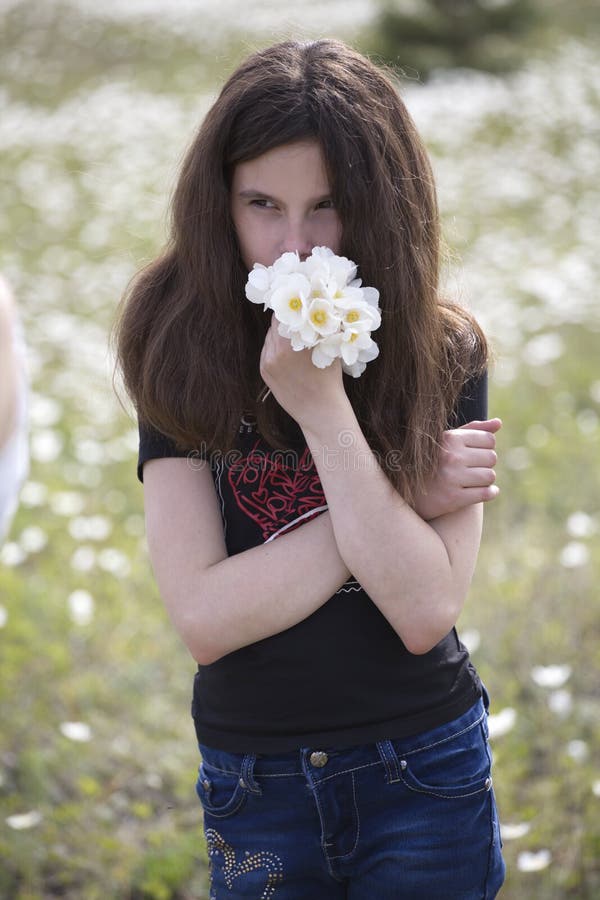 Girl with flower bouquet stock photo. Image of holding 25252940
