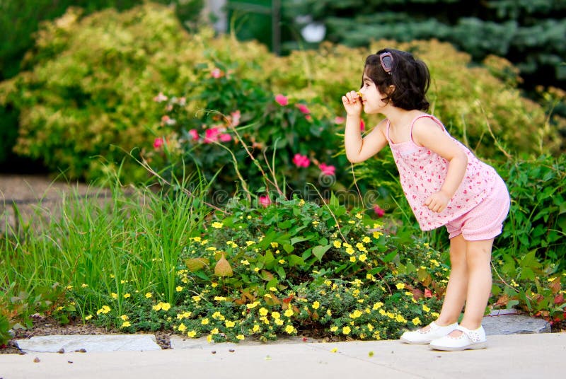 Girl in flower garden