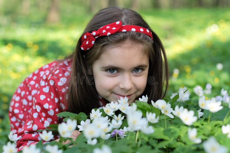 Girl in flowers stock photo. Image of little, beauty 10598856