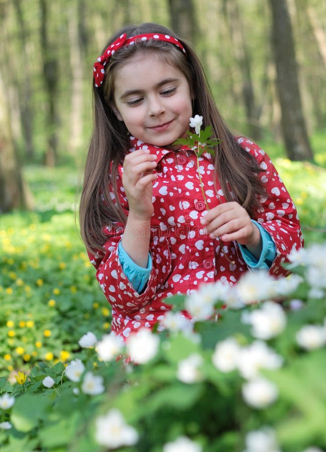 Girl in flowers stock image. Image of cute, face, female 10599243