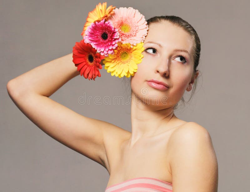 Girl with flowers stock image. Image of eyelashes, women 18281447