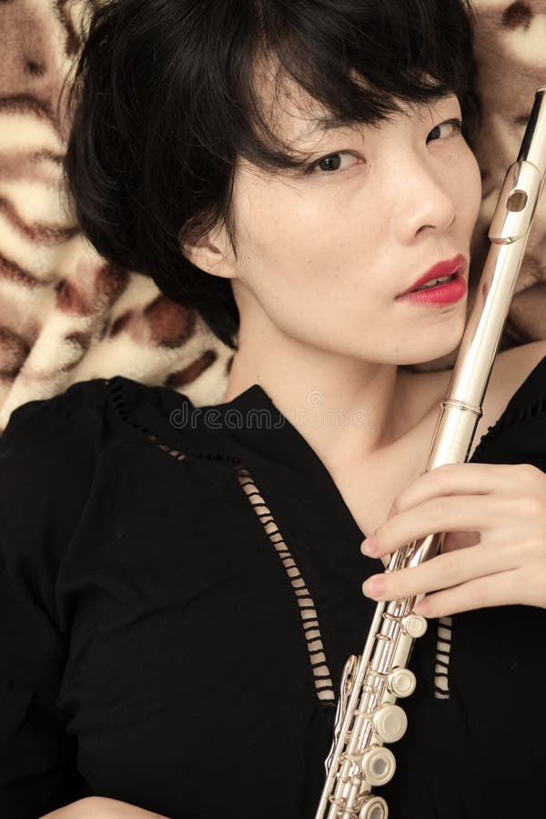 Girl and flute stock photo. Image of filled, china, musical 53722004