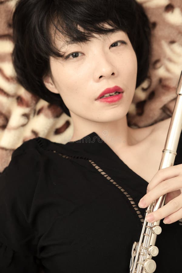 Girl and flute stock image. Image of life, look, beautiful 53722051