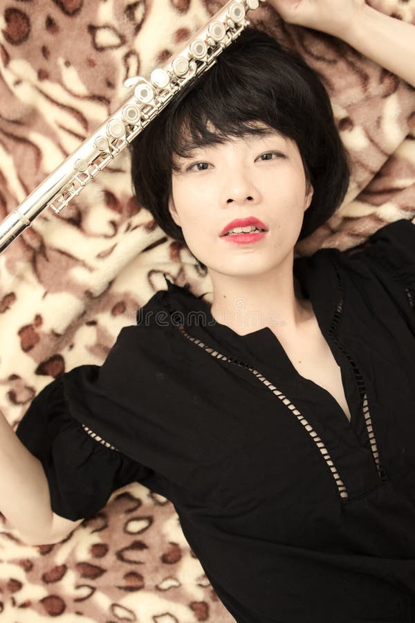 Girl and flute stock image. Image of flute, china, portraits 53722517