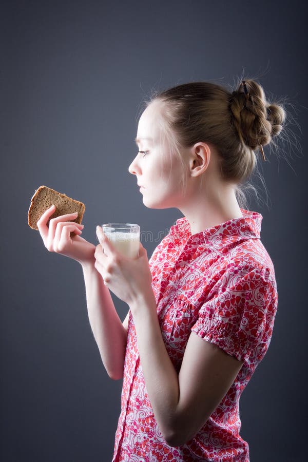 Girl with food stock image