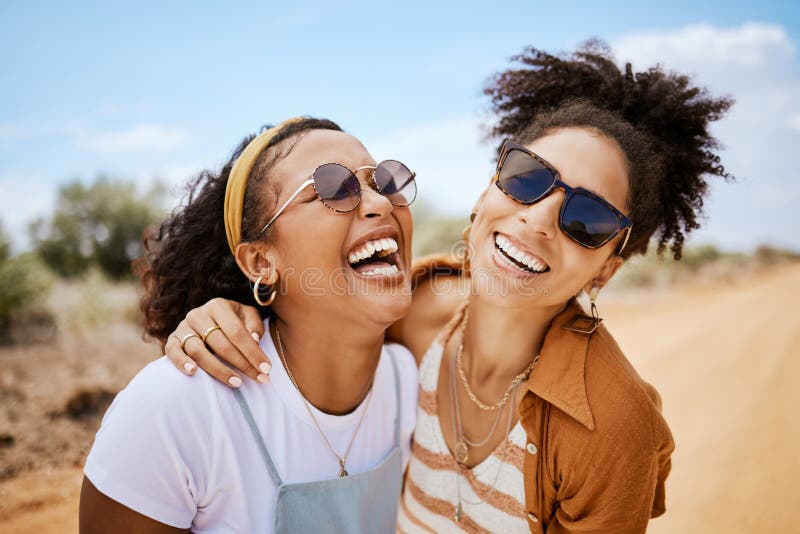 Girl Friends Hug And Travel Summer Vacation Outdoors On Safari