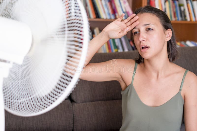 Woman Suffering for Summer Heat Cooling at Home Stock Photo - Image of ...