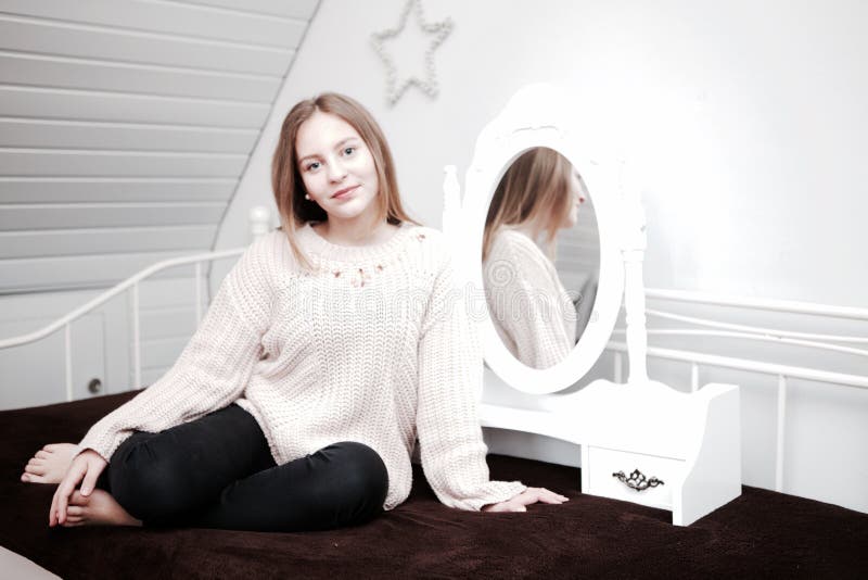 Girl in Front of a Mirror stock photo. Image of briliance 96883074
