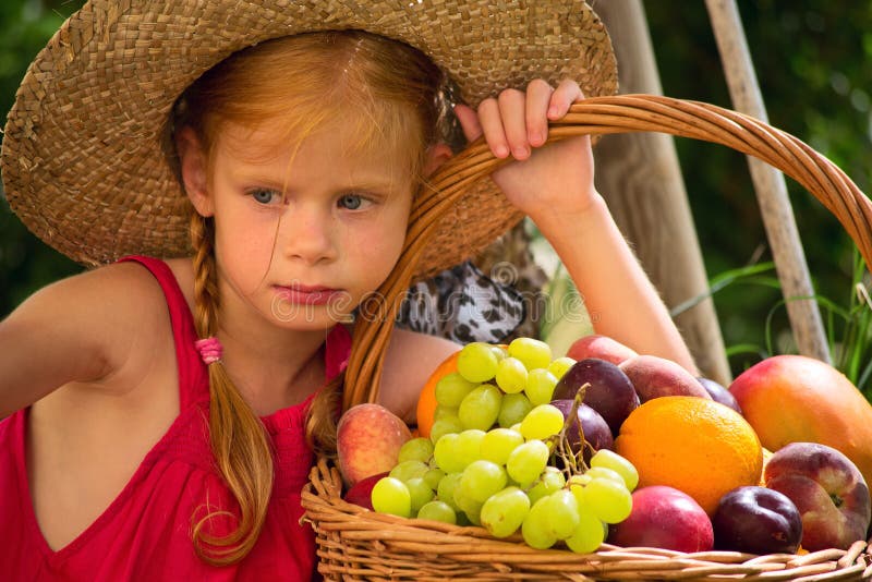 Girl and fruit basket stock image. Image of smile, outdoor 26313803