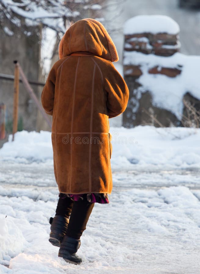 Girl in a Fur Coat Walking on the Road in Winter Stock Photo Image of