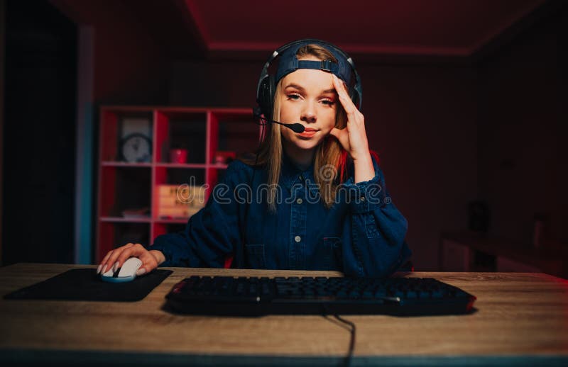 Excited Girl Gamer Sitting at the Table, Playing Online Games Stock Image -  Image of headset, esports: 136171701