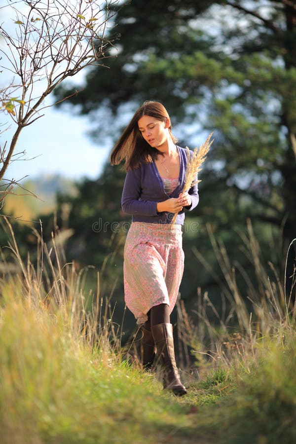 Girl is gathering plants