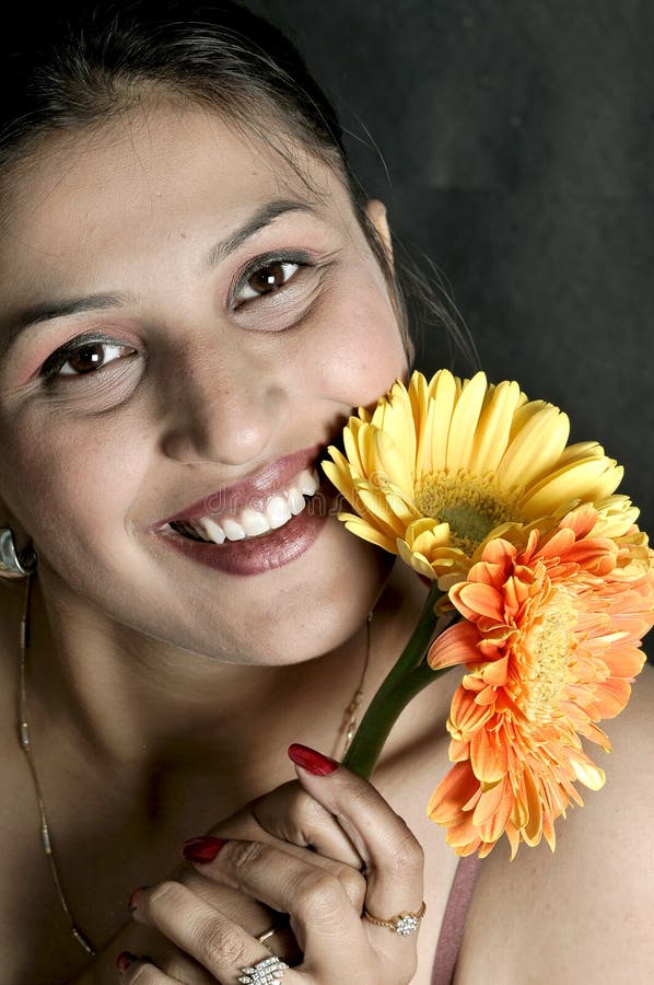 Girl with gerbera flowers