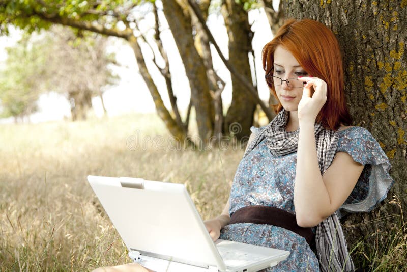 Girl in glasses and notebook