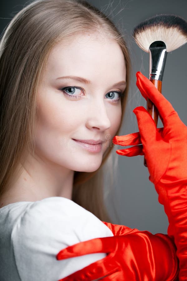 Girl in gloves with brush stock image. Image of cosmetic 19418195