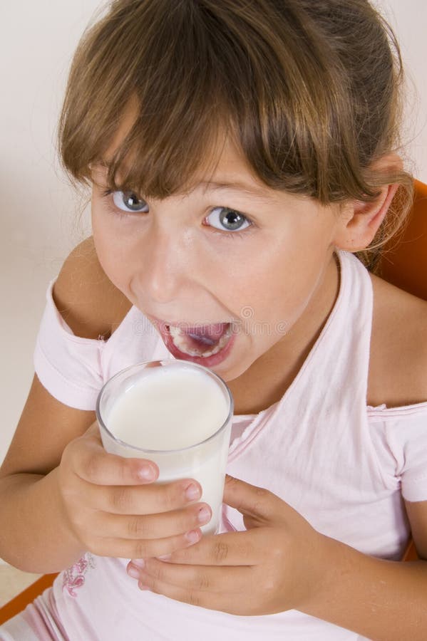 Girl going to drink milk