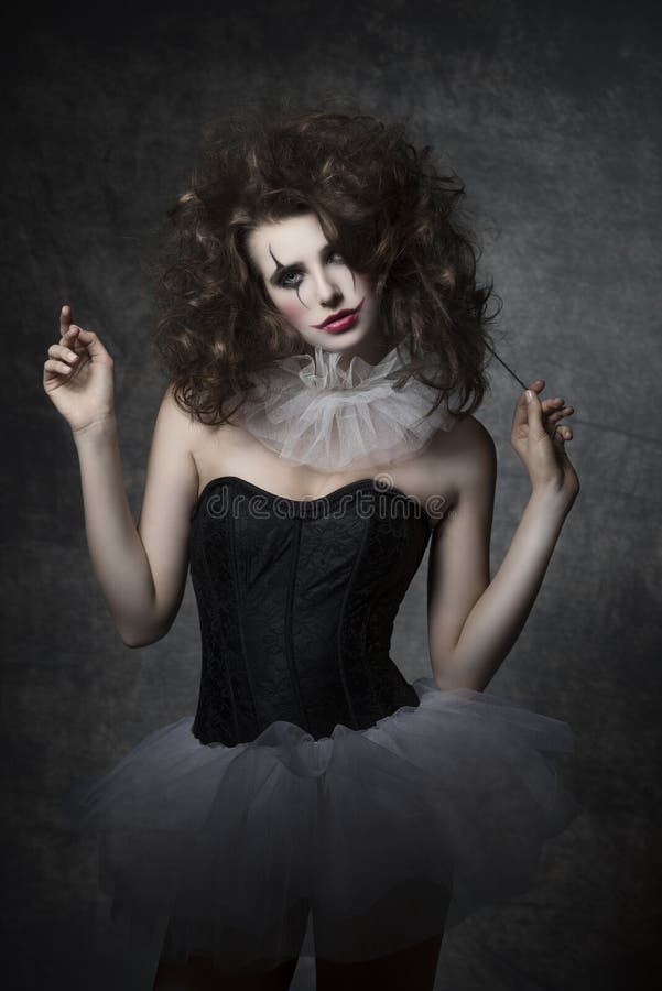 Girl with gothic clown make-up