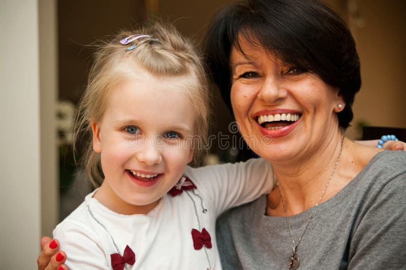 Girl and grandmother smiling stock photos Girl and grandmother smiling stock photos