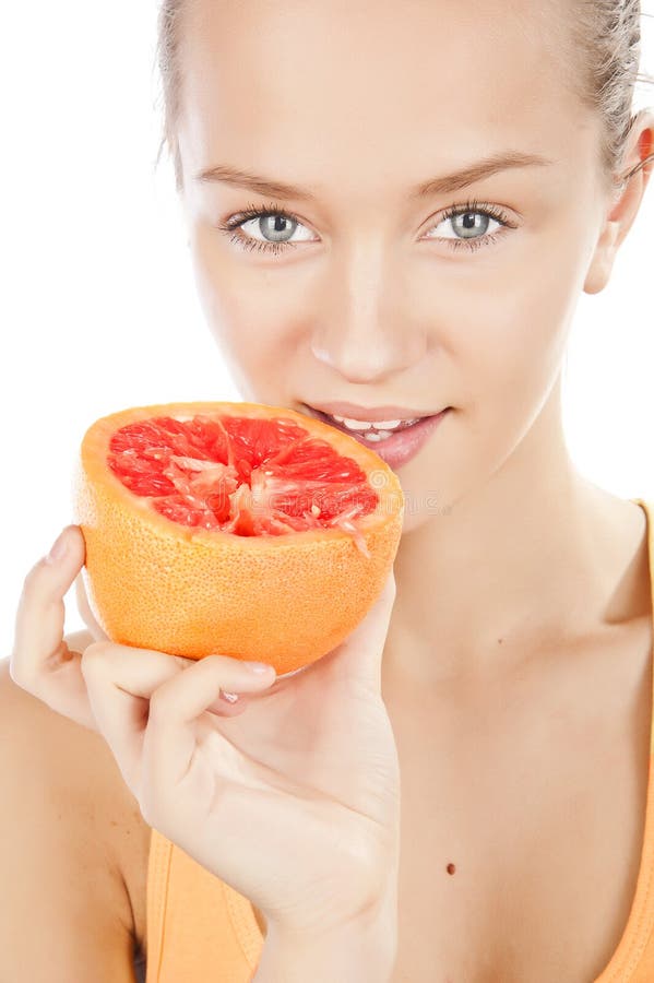 Girl with grapefruit