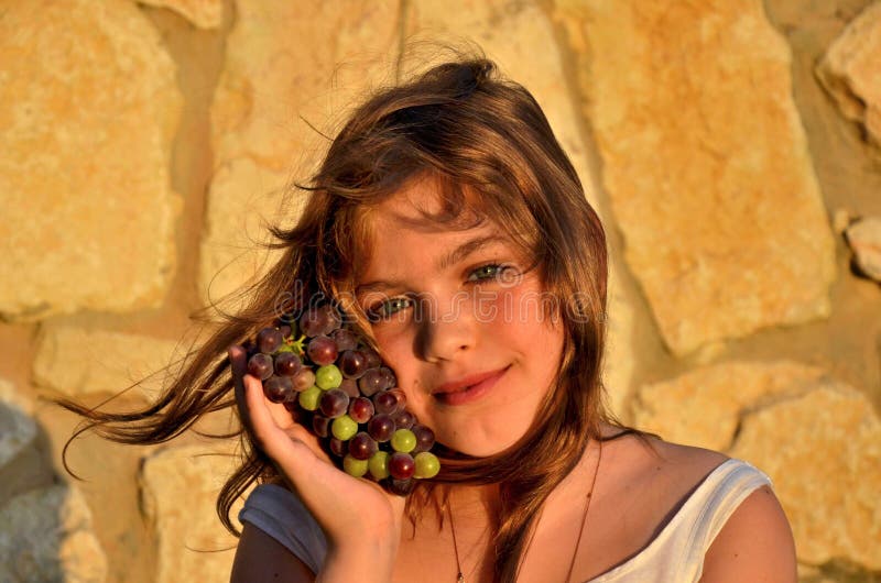 Girl with grapes