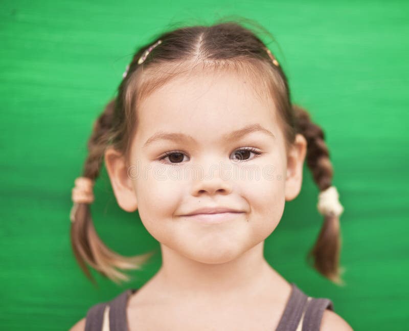 Girl on a green background stock photo. Image of green 25351892