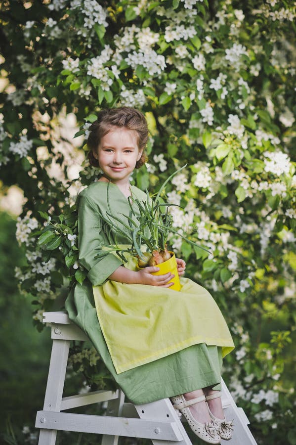 The Child is Playing in the Spring Garden 8263. Stock Photo - Image of ...