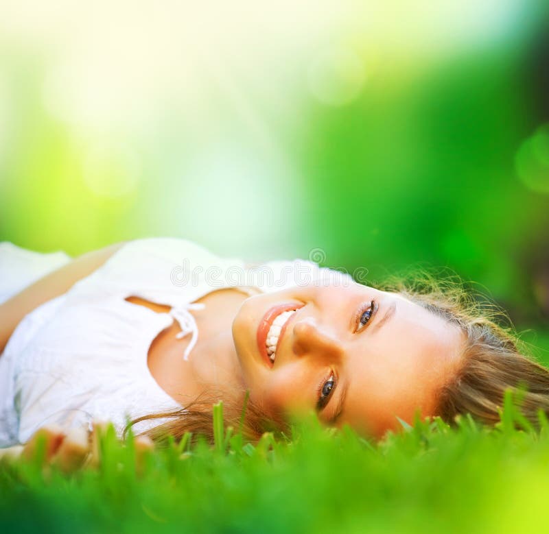 Girl in Green Grass royalty free stock photo Girl in Green Grass royalty free stock photo
