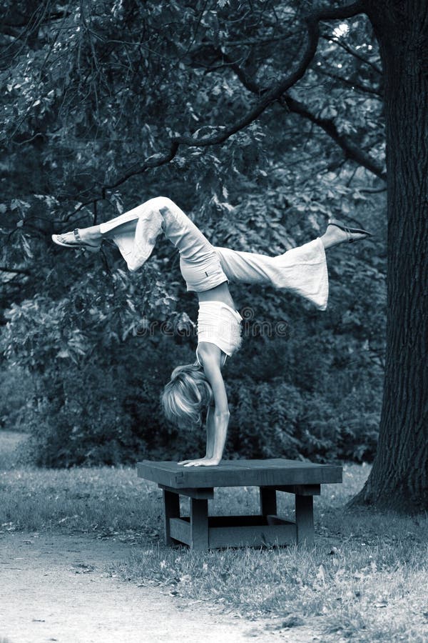 Girl gymnast in park