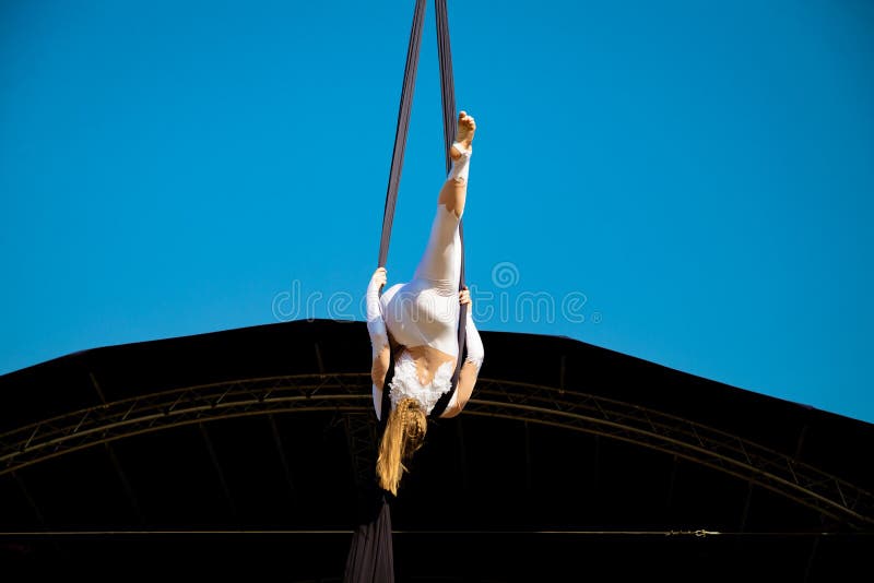 Girl on a Gymnastic Ring Demonstrates Exercises Stock Photo Image of